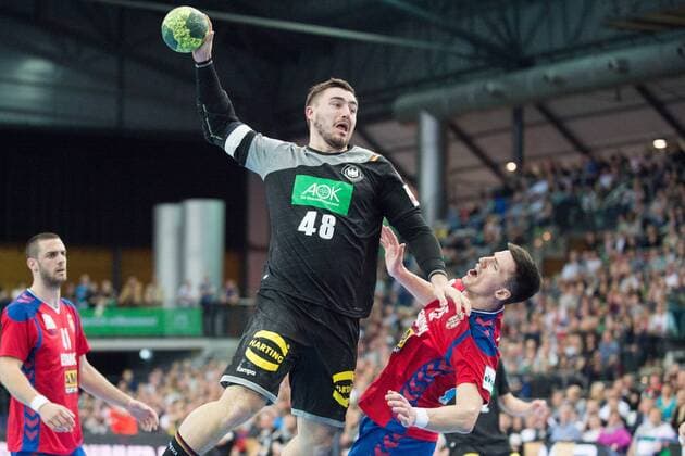 Jannik KOHLBACHER li GER vs Nemanja Zelenovic SRB action duel handball Laenderpiel der Manner Friendly Match Germany GER Serbia SRB 26 19 in Leipzig Germany on 04 04 2018 Â