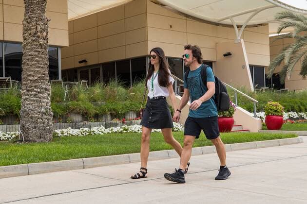Fernando Alonso McLaren Honda arrives with girlfriend at the Grand Prix of Bahrain 2018 Race Motorsport Formula 1 05 04 2018 Sachir Copyright: xEIBNER Illmannx EP_EER