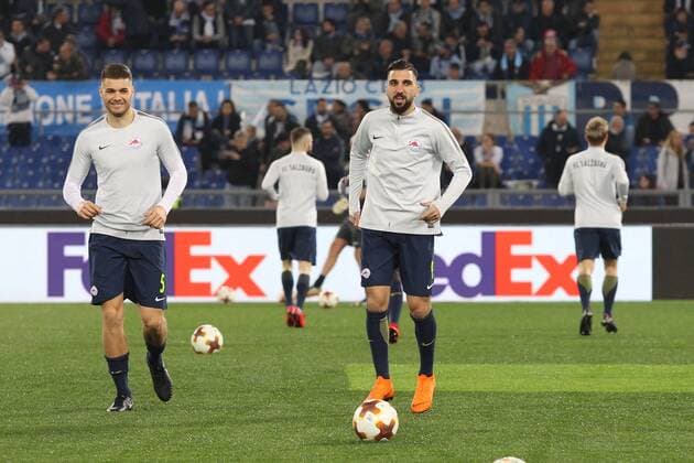 SOCCER - EL, Lazio vs RBS ROME,ITALY,05.APR.18 - SOCCER - UEFA Europa League, quarterfinal, SS Lazio vs Red Bull Salzburg. Image shows Duje Caleta-Car and Munas Dabbur (RBS). GEPAxpictures xMathiasxMandl