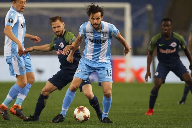 SOCCER - EL, Lazio vs RBS ROME,ITALY,05.APR.18 - SOCCER - UEFA Europa League, quarterfinal, SS Lazio vs Red Bull Salzburg. Image shows Andreas Ulmer (RBS) and Marco Parolo (Lazio). GEPAxpictures xMathiasxMandl