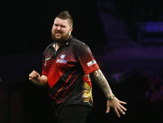 5th April 2018, Echo Arena, Liverpool, England; Unibet Premier League Darts; Darts fans await tonight s Judgement Michael Smith (ENG) reacts during his match against Raymond van Barneveld (NLD) as he storms to a 7-0 win  ActionPlus12008936