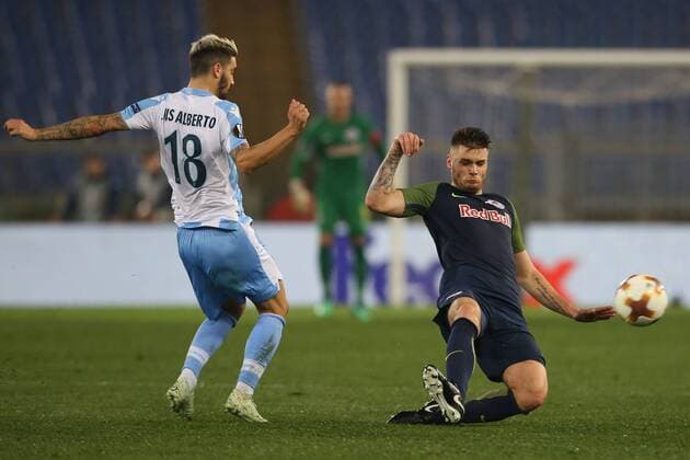 SOCCER - EL, Lazio vs RBS ROME,ITALY,05.APR.18 - SOCCER - UEFA Europa League, quarterfinal, SS Lazio vs Red Bull Salzburg. Image shows Luis Alberto (Lazio) and Duje Caleta-Car (RBS). GEPAxpictures xMathiasxMandl
