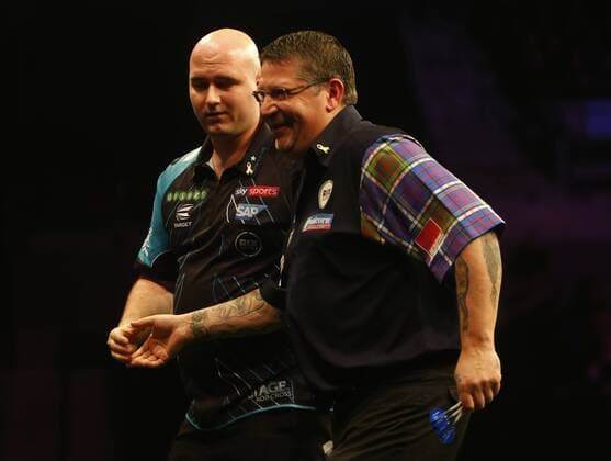 5th April 2018, Echo Arena, Liverpool, England; Unibet Premier League Darts; Rob Cross (ENG) (left) shares a joke with Gary Anderson (SCO) after he had won their match 7-5  ActionPlus12008963