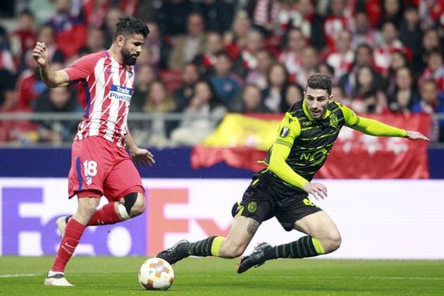Atletico de Madrid s Diego Costa (l) and Sporting Clube de Portugal s Cristiano Piccini during Europa League Quarter-finals, 1st leg. April 5,2018.  (2018040514)