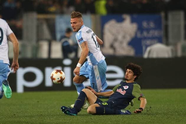 SOCCER - EL, Lazio vs RBS ROME,ITALY,05.APR.18 - SOCCER - UEFA Europa League, quarterfinal, SS Lazio vs Red Bull Salzburg. Image shows Ciro Immobile (Lazio) and Andre Ramalho (RBS). GEPAxpictures xMathiasxMandl
