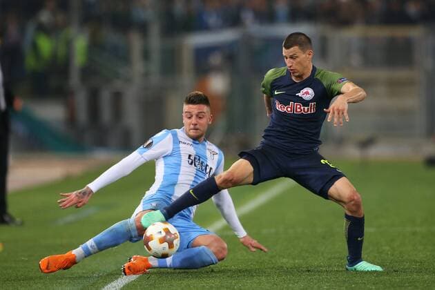 SOCCER - EL, Lazio vs RBS ROME,ITALY,05.APR.18 - SOCCER - UEFA Europa League, quarterfinal, SS Lazio vs Red Bull Salzburg. Image shows Sergej Milinkovic Savic (Lazio) and Stefan Lainer (RBS). GEPAxpictures xMathiasxMandl