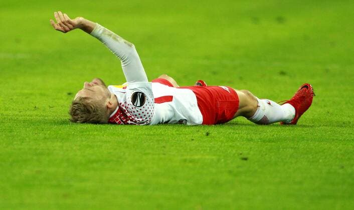 GER Europa League Quarterfinal RasenBallsport Leipzig vs Besiktas Istanbul 05 04 18 Leipzig Red Bull Arena GER Season 2017 2018 UEFA Europa League Quarterfinal RasenBallsport Leipzig vs Olympique Marseille in action Konrad Laimer Leipzig injured on the ground