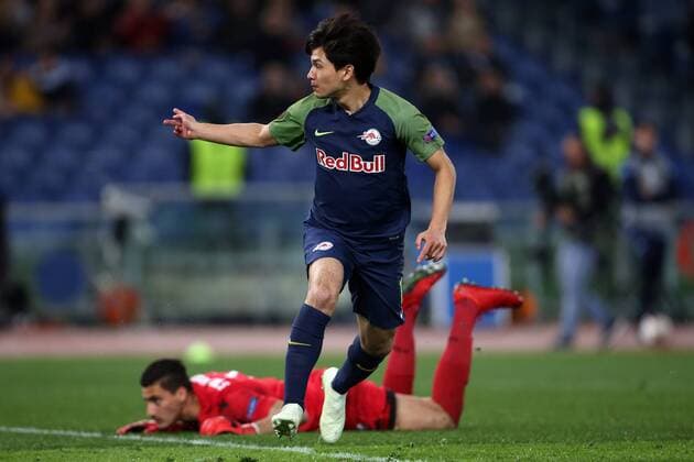 5th April 2018, Stadio Olimpico, Rome, Italy; UEFA Europa League football, quarter final, 1st leg, Lazio versus FC Salzburg; Takumi Minamino of Salzburg celebrates after scoring a goal in the 71th minute for 2-2 past goalkeeper Thomas Strakosha of Lazio  ActionPlus12009038