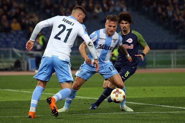 5th April 2018, Stadio Olimpico, Rome, Italy; UEFA Europa League football, quarter final, 1st leg, Lazio versus FC Salzburg; Sergej Milinkovic-Savic and Ciro Immobile of Lazio keep the ball from Andre Ramalho of Salzburg  ActionPlus12009007