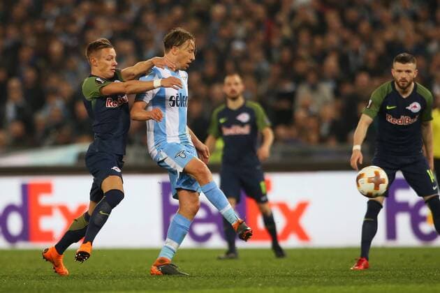 SOCCER - EL, Lazio vs RBS ROME,ITALY,05.APR.18 - SOCCER - UEFA Europa League, quarterfinal, SS Lazio vs Red Bull Salzburg. Image shows Hannes Wolf (RBS) and Lucas Leiva Pezzini (Lazio). GEPAxpictures xMathiasxMandl