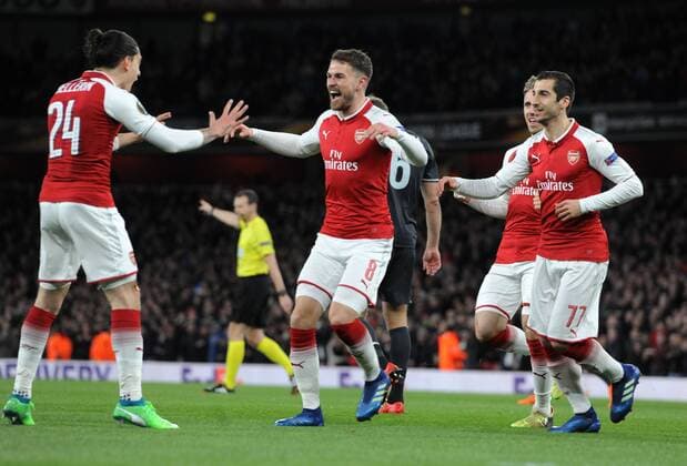 Football - 2017 2018 UEFA Europa League - Quarter-Final, First Leg: Arsenal vs. PFC CSKA Moscow Aaron Ramsey of Arsenal celebrates scoring goal no 1,with Bellerin and Mkhitaryan at The Emirates. COLORSPORT ANDREW COWIE 