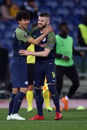 5th April 2018, Stadio Olimpico, Rome, Italy; UEFA Europa League football, quarter final, 1st leg, Lazio versus FC Salzburg; (L-R) Takumi Minamino of Salzburg celebrates with teammates Valon Berisha after scoring a goal in the 71st minute  ActionPlus12009043