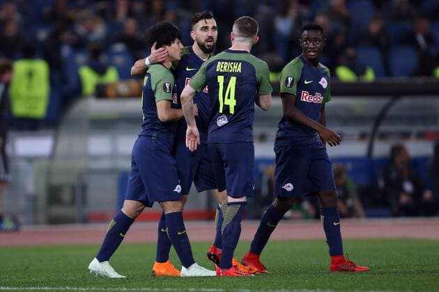 5th April 2018, Stadio Olimpico, Rome, Italy; UEFA Europa League football, quarter final, 1st leg, Lazio versus FC Salzburg; (L-R) Takumi Minamino of Salzburg celebrates with teammates after scoring a goal in the 71st minute  ActionPlus12009044
