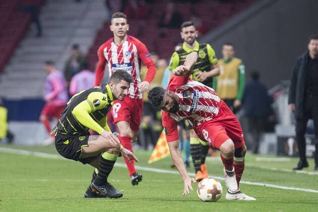 Atletico de Madrid Diego Costa and Sporting de Lisboa Cristiano Piccini during UEFA Europa League match between Atletico de Madrid and Sporting de Lisboa at Wanda Metropolitano in Madrid, Spain. April 05, 2018.  (20180405008)