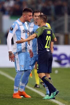 5th April 2018, Stadio Olimpico, Rome, Italy; UEFA Europa League football, quarter final, 1st leg, Lazio versus FC Salzburg; (L-R) Sergej Milinkovic-Savic of Lazio argues with Stefan Lainer of Salzburg  ActionPlus12009022