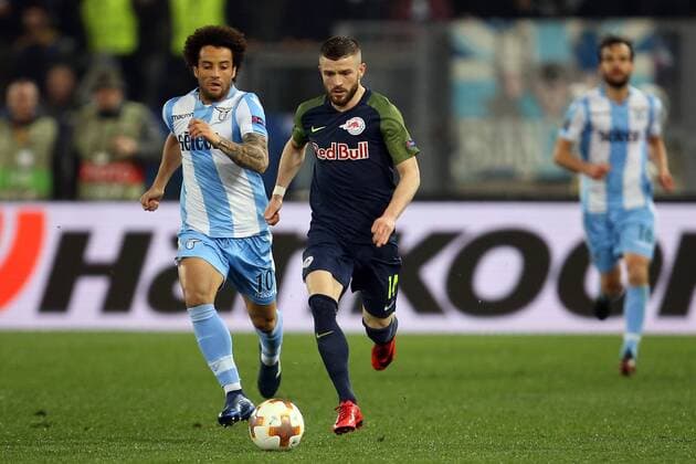 5th April 2018, Stadio Olimpico, Rome, Italy; UEFA Europa League football, quarter final, 1st leg, Lazio versus FC Salzburg; (L-R) Felipe Anderson of Lazio challenges Valon Berisha of Salzburg  ActionPlus12009033