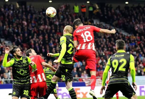 (180406) -- MADRID, April 6, 2018 -- Atletico Madrid s Diego Costa (2nd R) heads for the ball during the UEFA Europa League quarter-final first leg soccer match between Atletico Madrid and Sporting Lisboa in Madrid, Spain, on April 5, 2018. Atletico Madrid won 2-0. ) (SP)SPAIN-MADRID-SOCCER-UEFA-EUROPA-QUARTERFINAL-ATLETICO VS SPORTING EdwardxPetersxLopez 