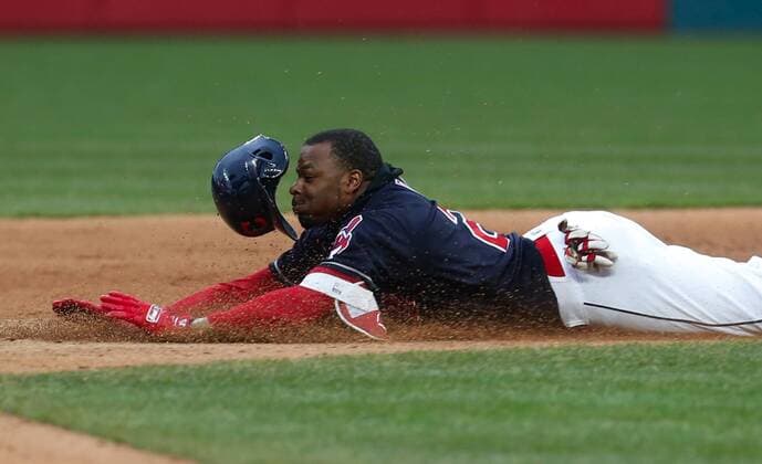 April 6, 2018 - Cleveland, OH, USA - The Cleveland Indians Rajai Davis slides safely into second while losing his helmet against the Kansas City Royals in the seventh inning on Friday, April 6, 2018, at Progressive Field in Cleveland. The Indians won, 3-2. Kansas City at Cleveland - ZUMAm67_ 20180406_zaf_m67_093 Copyright: xLeahxKlafczynskix