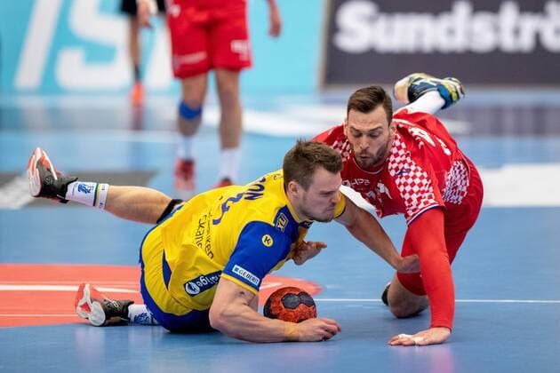 180407 Swedens Mark Olsson and Croatias Jakov Vrankovic during the international handball match between Sweden and Croatia on April 7, 2018 in Norrköping  Copyright: JosefinexLoftenius BB180407LO011