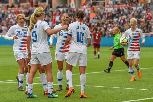 HOUSTON, TX - APRIL 08: Team USA swarms U.S. Women s Soccer midfielder Carli Lloyd (10) after she scored her 100th international goal during the soccer match between the USA and Mexico Women s National Teams on April 8, 2018 at BBVA Stadium in Houston, Texas. (Photo by Ken Murray Icon Sportswire) SOCCER: APR 08 Women s - USA v Mexico Icon180408005 EDITORIAL USE ONLY