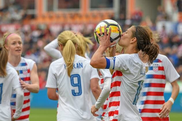HOUSTON, TX - APRIL 08: U.S. Women s Soccer midfielder Carli Lloyd (10) kisses the ball after scoring her 100th international goal during the soccer match between the USA and Mexico Women s National Teams on April 8, 2018 at BBVA Stadium in Houston, Texas. (Photo by Ken Murray Icon Sportswire) SOCCER: APR 08 Women s - USA v Mexico Icon180408007 EDITORIAL USE ONLY