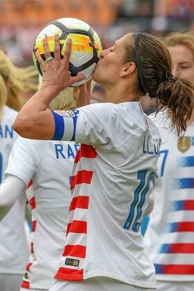 HOUSTON, TX - APRIL 08: U.S. Women s Soccer midfielder Carli Lloyd (10) kisses the ball after scoring her 100th international goal during the soccer match between the USA and Mexico Women s National Teams on April 8, 2018 at BBVA Stadium in Houston, Texas. (Photo by Ken Murray Icon Sportswire) SOCCER: APR 08 Women s - USA v Mexico Icon180408008 EDITORIAL USE ONLY