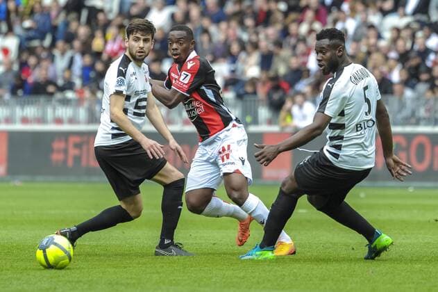 Wylan Cyprien (OGC Nice) - Joris Gnagnon (FC Rennes) FOOTBALL : OGC Nice vs FC Rennes - Ligue 1 - Nice - 08 04 2018 NorbertScanella Panoramic 