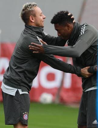 Rafinha and David Alaba warm welcome before the training Football FC Bayern Munich Final training before the CL game against Sevilla FC 10 04 2018