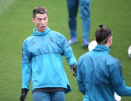April 10, 2018 - Madrid, Spain - Cristiano Ronaldo of Real Madrid CF jokes with his team mates during a training session ahead of their UEFA Champions LEague quarter final second leg match against Juventus at Valdebebas training ground on April 10, 2018 in Madrid, Spain. Real Madrid Training  - ZUMAn230 20180410_zaa_n230_035 Copyright: xRaddadxJebarahx