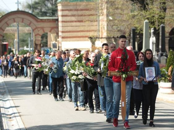 10.04.2018 Belgrade(Serbia) Men s handball New cemetery funeral of Branislav Pokrajac ex handball player and coach of Yugoslavia,Porto,Sporting. Darko Stevanovic (2nd from right) wearing a cross with the name of the deceased Pokrajac beside his picture. : 