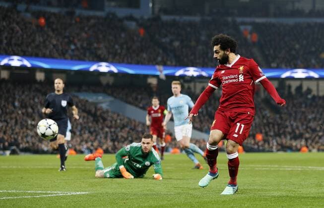 Liverpool s Mohamed Salah scoring his sides opening goal during the Champions League Quarter Final 2nd Leg match at the Etihad Stadium, Manchester. Picture date: 10th April 2018. Picture credit should read: David Klein Sportimage EDITORIAL USE ONLY. No use with unauthorised audio, video, data, fixture lists, club league logos or live services. Online in-match use limited to 120 images, no video emulation. No use in betting, games or single club league player publications.