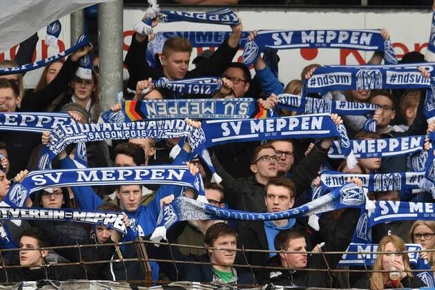 Football 3 League 23 Gameday SV Meppen FC Carl Zeiss Jena on 04 04 2018 in the Haensch Arena in Meppen Fan fans from Meppen lift their scarf in the air MT