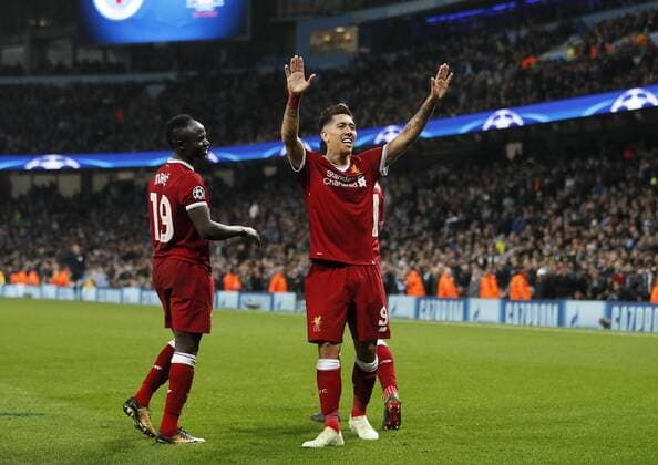 Liverpool s Roberto Firmino celebrates scoring his sides second goal during the Champions League Quarter Final 2nd Leg match at the Etihad Stadium, Manchester. Picture date: 10th April 2018. Picture credit should read: David Klein Sportimage EDITORIAL USE ONLY. No use with unauthorised audio, video, data, fixture lists, club league logos or live services. Online in-match use limited to 120 images, no video emulation. No use in betting, games or single club league player publications.