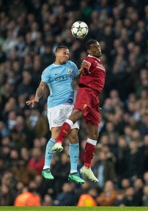 Gabriel Jesus of Man City & Georginio Wijnaldum of Liverpool during the UEFA Champions League QF 2nd leg match between Manchester City and Liverpool at the Etihad Stadium, Manchester, England on 10 April 2018. Copyright: xAndyxRowlandx PMI-1960-0001
