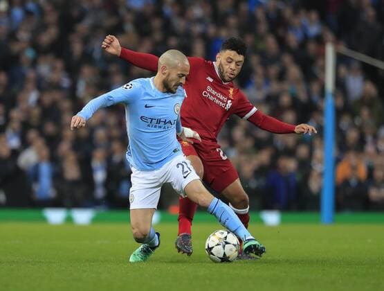 10th April 2018, Etihad Stadium, Manchester, England; UEFA Champions League football, quarter final, second leg; Manchester City verses Liverpool; David Silva of Manchester City shields Alex Oxlade-Chamberlain of Liverpool from the ball  ActionPlus12011648