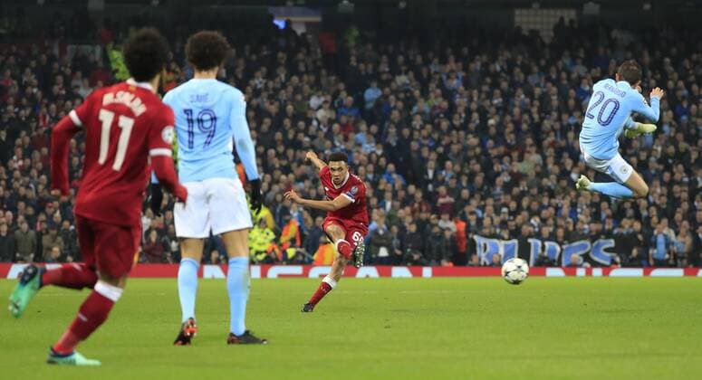 10th April 2018, Etihad Stadium, Manchester, England; UEFA Champions League football, quarter final, second leg; Manchester City verses Liverpool; Trent Alexander-Arnold of Liverpool fires a shot on past the attempted block from Bernardo Silva  ActionPlus12011654