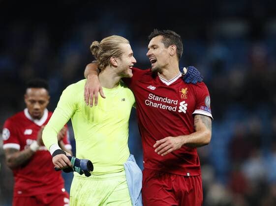 Liverpool s Loris Karius and Dejan Lovren celebrate at the final whistle during the Champions League Quarter Final 2nd Leg match at the Etihad Stadium, Manchester. Picture date: 10th April 2018. Picture credit should read: David Klein Sportimage EDITORIAL USE ONLY. No use with unauthorised audio, video, data, fixture lists, club league logos or live services. Online in-match use limited to 120 images, no video emulation. No use in betting, games or single club league player publications.