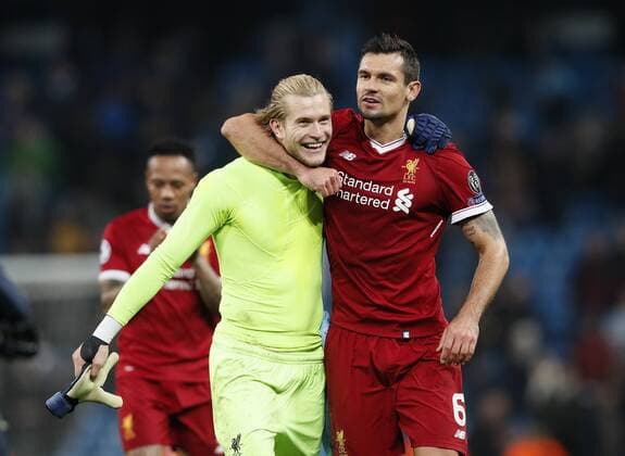 Liverpool s Loris Karius and Dejan Lovren celebrate at the final whistle during the Champions League Quarter Final 2nd Leg match at the Etihad Stadium, Manchester. Picture date: 10th April 2018. Picture credit should read: David Klein Sportimage EDITORIAL USE ONLY. No use with unauthorised audio, video, data, fixture lists, club league logos or live services. Online in-match use limited to 120 images, no video emulation. No use in betting, games or single club league player publications.