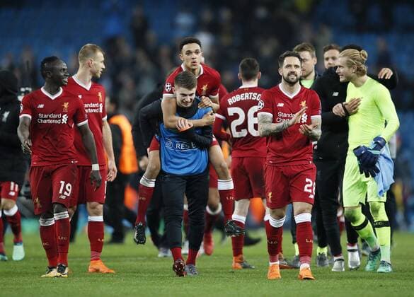 Liverpool s Trent Alexander-Arnold celebrates at the final whistle during the Champions League Quarter Final 2nd Leg match at the Etihad Stadium, Manchester. Picture date: 10th April 2018. Picture credit should read: David Klein Sportimage EDITORIAL USE ONLY. No use with unauthorised audio, video, data, fixture lists, club league logos or live services. Online in-match use limited to 120 images, no video emulation. No use in betting, games or single club league player publications.