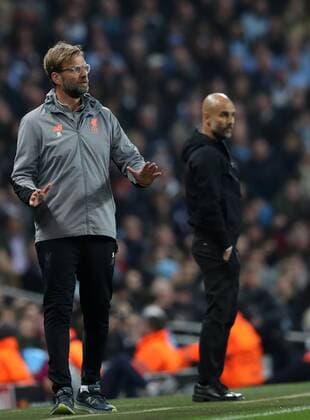 Football - 2017 2018 UEFA Champions League - Quarter-Final, Second Leg: Manchester City (0) vs. Liverpool (3) Jurgen Klopp manager of Liverpool and Manchester City Manager Josep Guardiola at The Etihad. COLORSPORT 