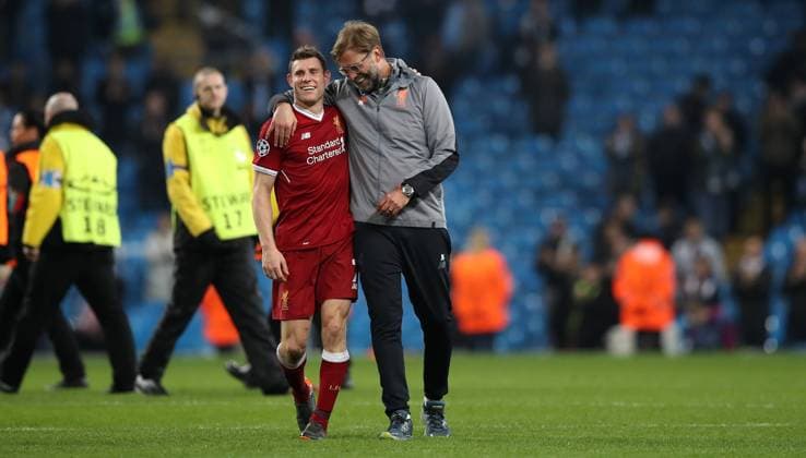 Football - 2017 2018 UEFA Champions League - Quarter-Final, Second Leg: Manchester City (0) vs. Liverpool (3) Jurgen Klopp manager of Liverpool celebrates with James Milner of Liverpool at The Etihad. COLORSPORT 