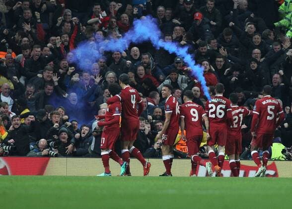 Manchester City v Liverpool UEFA Champions League Quarter Final Mohamed Salah of Liverpool celebrates in front of the Liverpool fans after scoring the first goal against Manchester City during the UEFA Champions League Quarter Final match at the Etihad Stadium, Manchester. Content Not Available For UK Newspapers Copyright: xMichaelxSedgwickx FIL-11629-0039