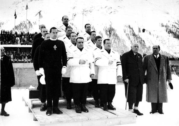 - SANKT MORITZ, SWITZERLAND: (FILE) This file picture dated February 1948 shows the podium of the bobsleigh event at the Winter Olympic Games Olympische Spiele Olympia OS in Sankt Moritz, Switzerland. At L, Belgian team, winner of the silver medal, with J. Mouve, G.Niels, F.Mansveld and M. Houben. A C, gold medal, and at R USA, bronze medal. ARCHIVES BELGAxARCHIVES  x32092206x