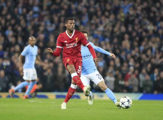 10th April 2018, Etihad Stadium, Manchester, England; UEFA Champions League football, quarter final, second leg; Manchester City verses Liverpool; Georginio Wijnaldum of Liverpool moves the ball forward  ActionPlus12011835