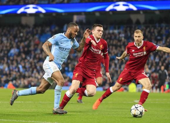 10th April 2018, Etihad Stadium, Manchester, England; UEFA Champions League football, quarter final, second leg; Manchester City verses Liverpool; Raheem Sterling of Manchester City is challenged by Andrew Robertson of Liverpool  ActionPlus12011854