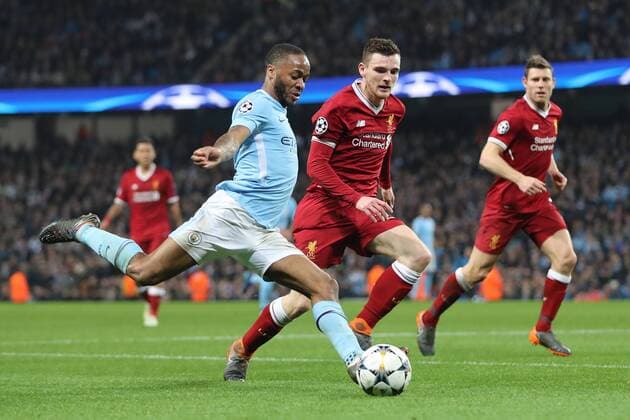 Manchester City v Liverpool UEFA Champions League Quarter Final Raheem Sterling of Manchester City and Andrew Robertson of Liverpool in action during the UEFA Champions League Quarter Final match at the Etihad Stadium, Manchester. Content Not Available For UK Newspapers Copyright: xMichaelxSedgwickx FIL-11629-0059