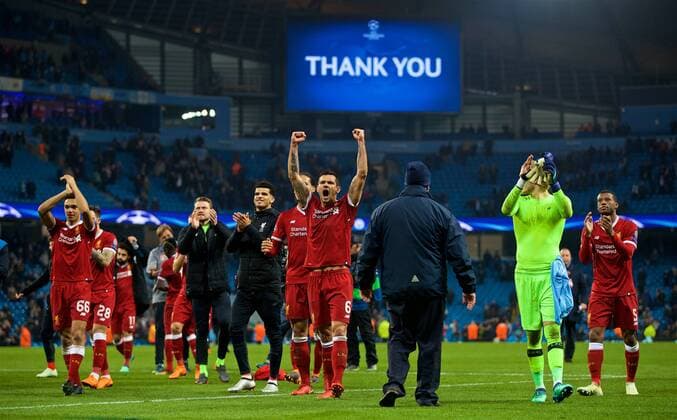 (180411) -- MANCHESTER, April 11, 2018 () -- Liverpool s players celebrate after the UEFA Champions League quarterfinal second leg soccer match between Manchester City and Liverpool in Manchester, Britain, on April 10, 2018. Liverpool won 5-1 on aggregate and advanced to the semifinal. () FOR EDITORIAL USE ONLY. NOT FOR SALE FOR MARKETING OR ADVERTISING CAMPAIGNS. NO USE WITH UNAUTHORIZED AUDIO, VIDEO, DATA, FIXTURE LISTS, CLUB LEAGUE LOGOS OR LIVE SERVICES. ONLINE IN-MATCH USE LIMITED TO 45 IMAGES, NO VIDEO EMULATION. NO USE IN BETTING, GAMES OR SINGLE CLUB LEAGUE PLAYER PUBLICATIONS.) (SP)BRITAIN-MANCHESTER-SOCCER-UEFA CHAMPIONS LEAGUE-MANCHESTER CITY VS LIVERPOOL Xinhua