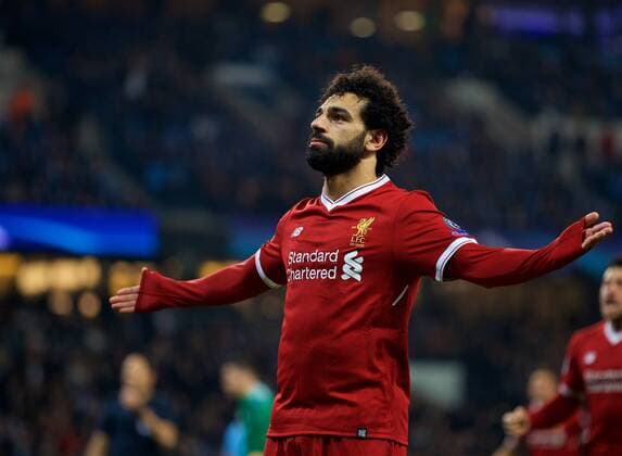 (180411) -- MANCHESTER, April 11, 2018 () -- Liverpool s Mohamed Salah celebrates after scoring during the UEFA Champions League quarterfinal second leg soccer match between Manchester City and Liverpool in Manchester, Britain, on April 10, 2018. Liverpool won 5-1 on aggregate and advanced to the semifinal. () FOR EDITORIAL USE ONLY. NOT FOR SALE FOR MARKETING OR ADVERTISING CAMPAIGNS. NO USE WITH UNAUTHORIZED AUDIO, VIDEO, DATA, FIXTURE LISTS, CLUB LEAGUE LOGOS OR LIVE SERVICES. ONLINE IN-MATCH USE LIMITED TO 45 IMAGES, NO VIDEO EMULATION. NO USE IN BETTING, GAMES OR SINGLE CLUB LEAGUE PLAYER PUBLICATIONS.) (SP)BRITAIN-MANCHESTER-SOCCER-UEFA CHAMPIONS LEAGUE-MANCHESTER CITY VS LIVERPOOL Xinhua
