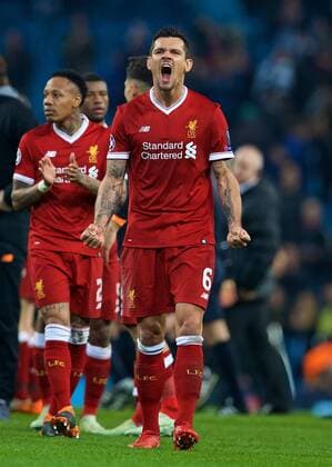 (180411) -- MANCHESTER, April 11, 2018 () -- Liverpool s Dejan Lovren (Front) celebrates after the UEFA Champions League quarterfinal second leg soccer match between Manchester City and Liverpool in Manchester, Britain, on April 10, 2018. Liverpool won 5-1 on aggregate and advanced to the semifinal. () FOR EDITORIAL USE ONLY. NOT FOR SALE FOR MARKETING OR ADVERTISING CAMPAIGNS. NO USE WITH UNAUTHORIZED AUDIO, VIDEO, DATA, FIXTURE LISTS, CLUB LEAGUE LOGOS OR LIVE SERVICES. ONLINE IN-MATCH USE LIMITED TO 45 IMAGES, NO VIDEO EMULATION. NO USE IN BETTING, GAMES OR SINGLE CLUB LEAGUE PLAYER PUBLICATIONS.) (SP)BRITAIN-MANCHESTER-SOCCER-UEFA CHAMPIONS LEAGUE-MANCHESTER CITY VS LIVERPOOL Xinhua
