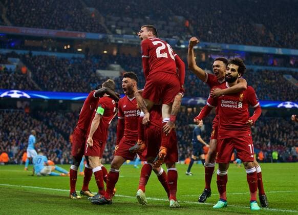 (180411) -- MANCHESTER, April 11, 2018 () -- Liverpool s Mohamed Salah (1st R) celebrates after scoring with his teammates during the UEFA Champions League quarterfinal second leg soccer match between Manchester City and Liverpool in Manchester, Britain, on April 10, 2018. Liverpool won 5-1 on aggregate and advanced to the semifinal. () FOR EDITORIAL USE ONLY. NOT FOR SALE FOR MARKETING OR ADVERTISING CAMPAIGNS. NO USE WITH UNAUTHORIZED AUDIO, VIDEO, DATA, FIXTURE LISTS, CLUB LEAGUE LOGOS OR LIVE SERVICES. ONLINE IN-MATCH USE LIMITED TO 45 IMAGES, NO VIDEO EMULATION. NO USE IN BETTING, GAMES OR SINGLE CLUB LEAGUE PLAYER PUBLICATIONS.) (SP)BRITAIN-MANCHESTER-SOCCER-UEFA CHAMPIONS LEAGUE-MANCHESTER CITY VS LIVERPOOL Xinhua